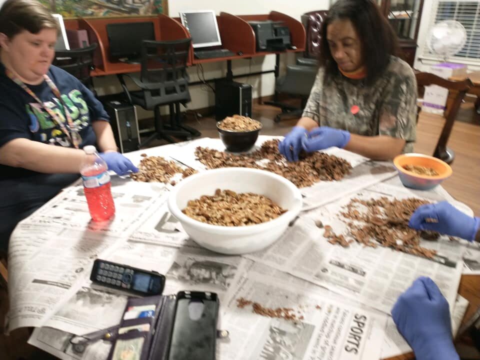Widows Oil Ministry volunteers serving the community