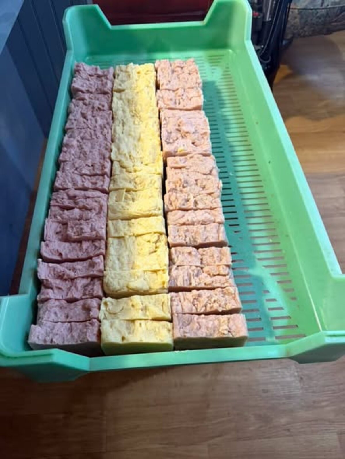 Fresh raw soap batter ready to be poured into molds by Pam Otts
